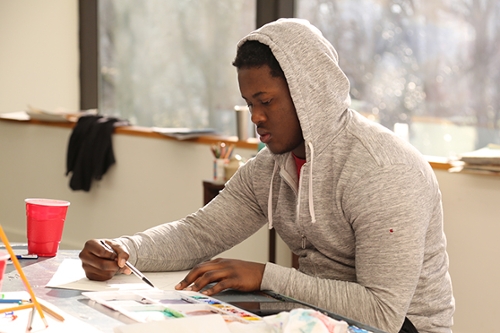 Student doing a preliminary sketch in a painting and drawing class. Pursue your art and design degree at LaGrange College. 